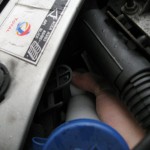 Peugeot 206 - Changing front bulb - removing screenwash filler